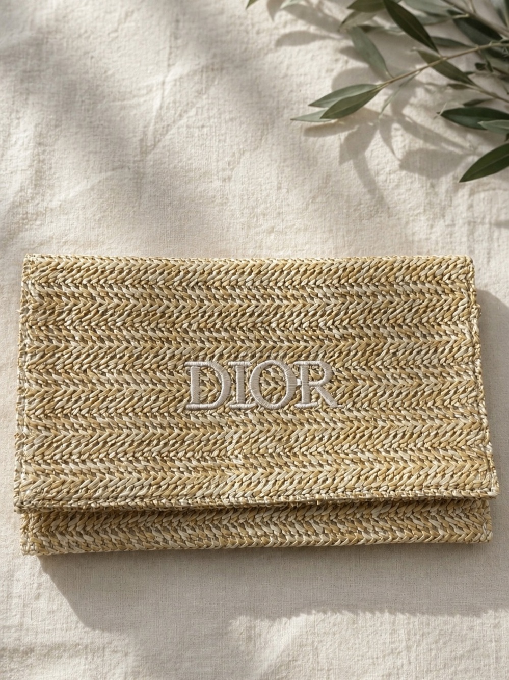 New Dior Raffia cosmetics pouch